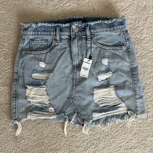 NWT Express denim skirt. distressed. never worn. size 2
